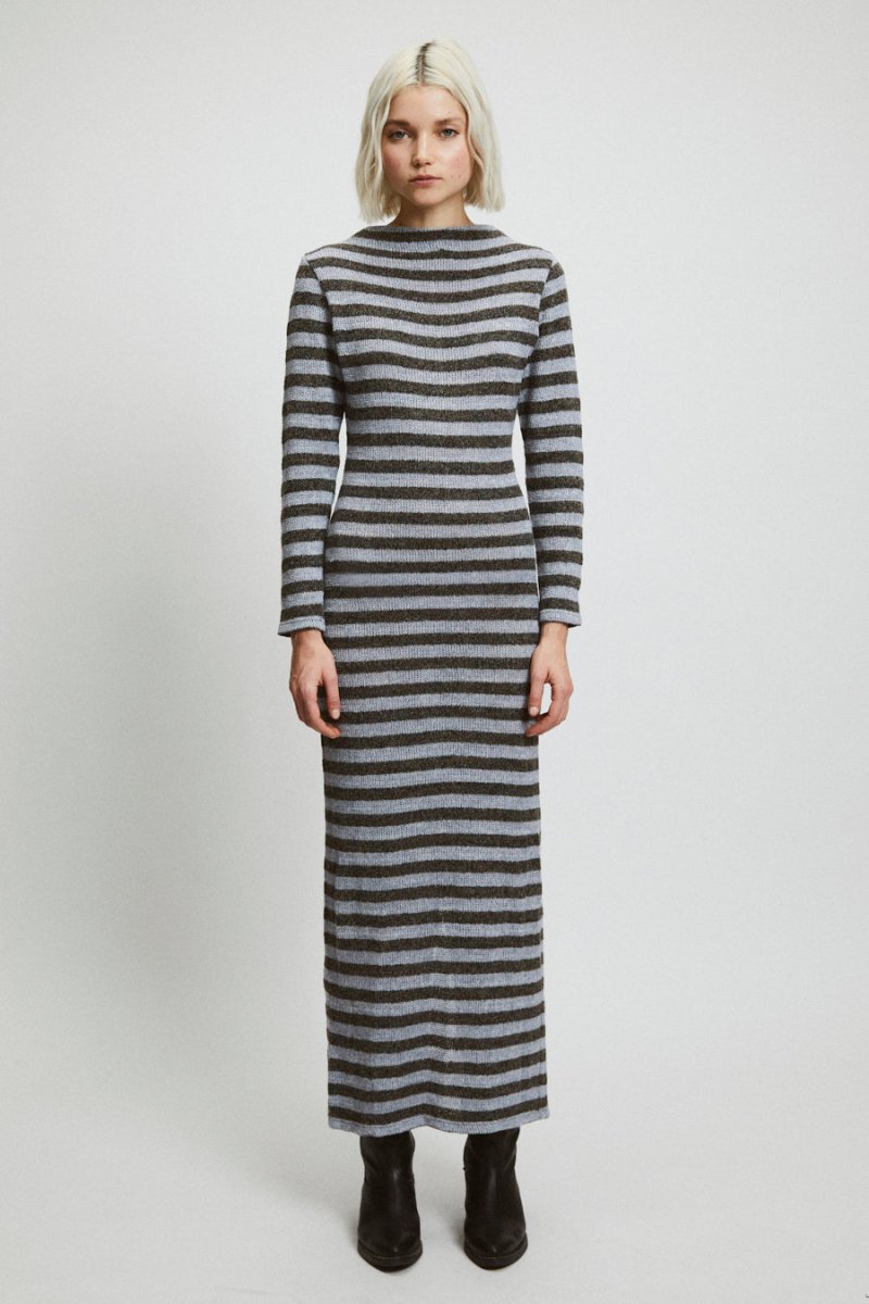 A long sleeve dark and light gray striped dress with a high neckline. The Alice Dress in Stripes is designed by Rita Row in Girona, Spain.