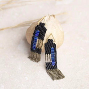Dangle Earrings made of black and lapis beads and antique brass chains. Handmade in Portland, OR.
