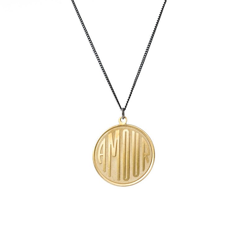 betsy & iya Big Amour necklace with non-oxidized finish.