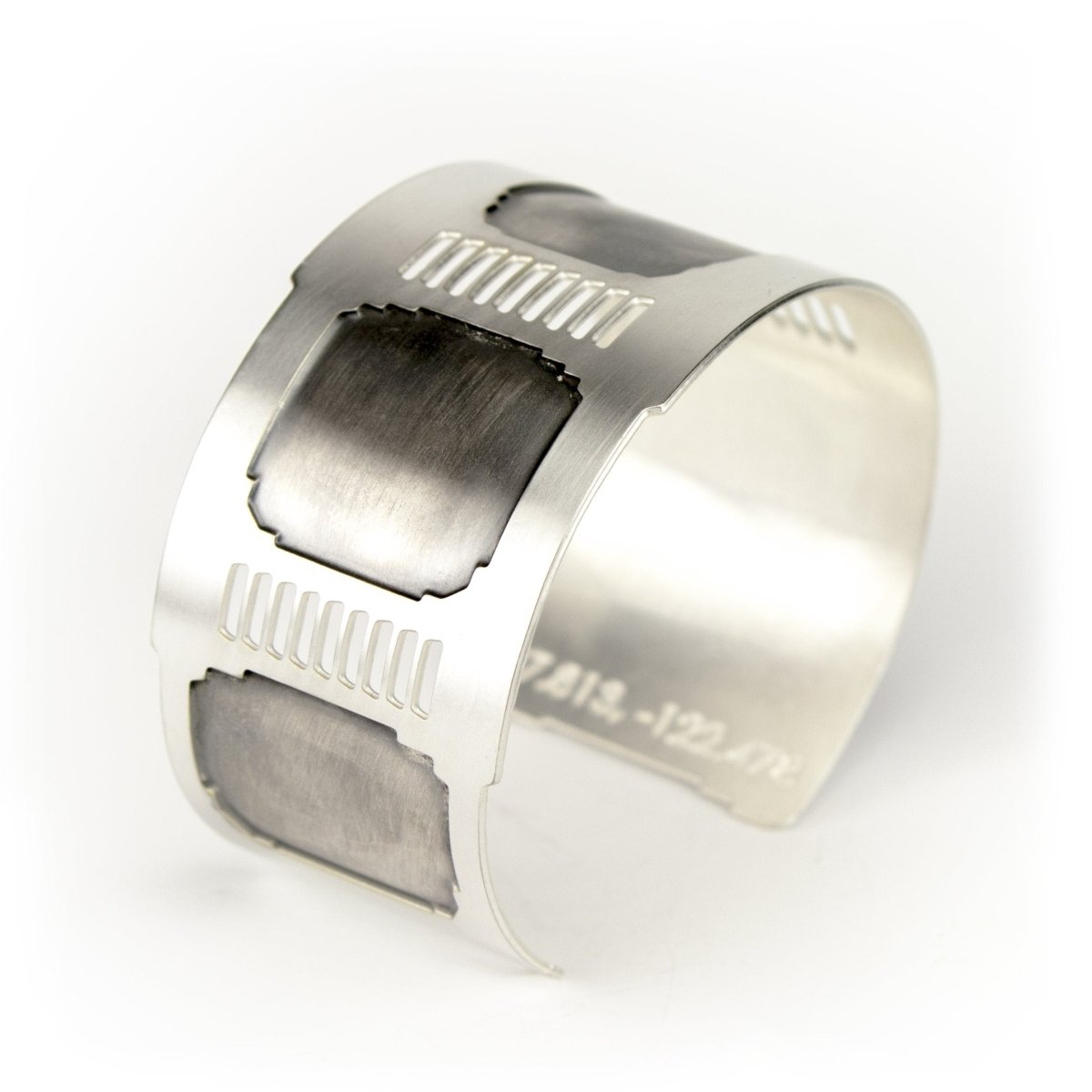 A silver version of betsy & iya's Golden Gate cuff bracelet.