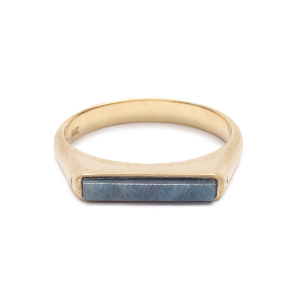 Sapphire Lucet ring with two white lab-grown diamonds, set in 14k recycled yellow gold. Designed and handcrafted in Portland, Oregon.