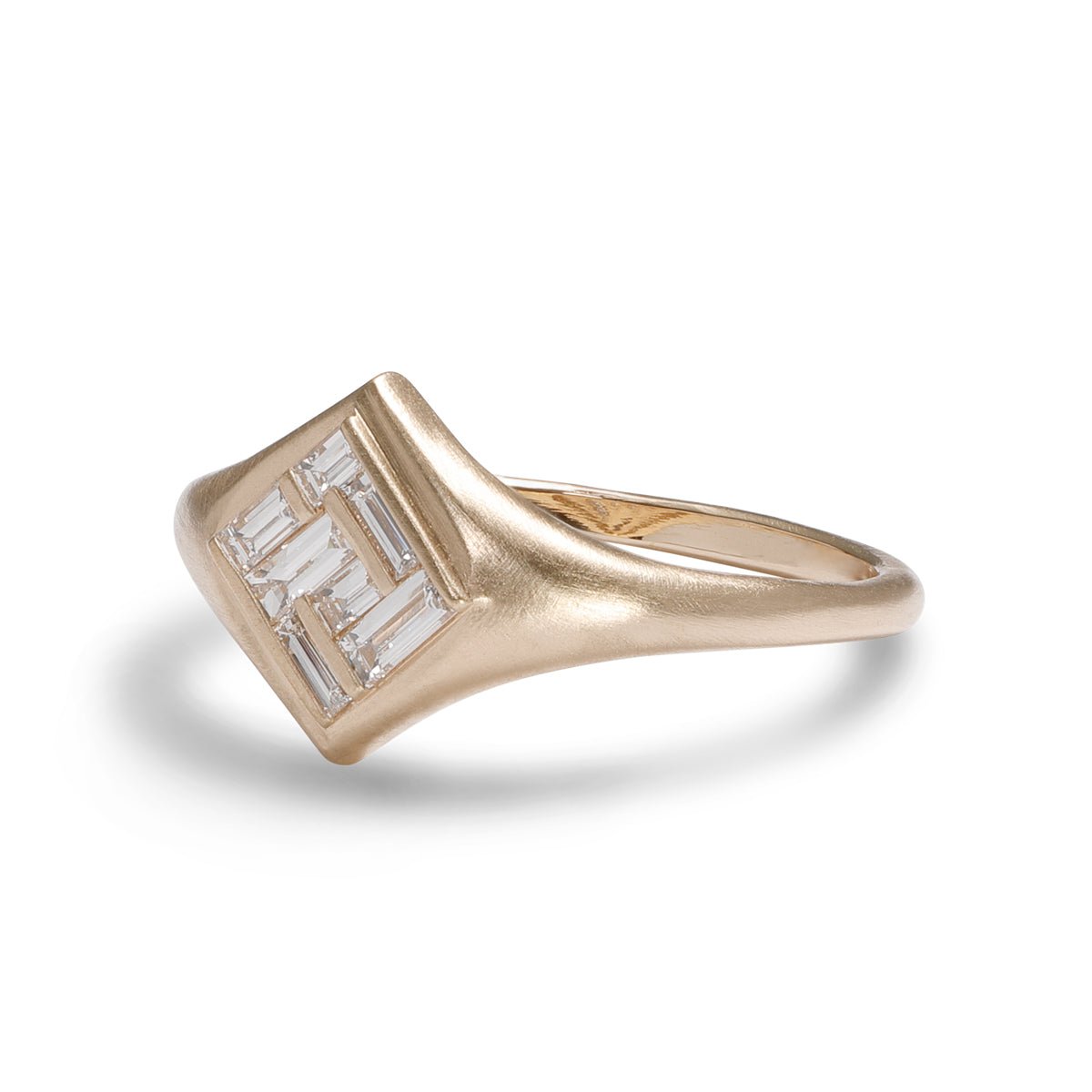 Elicio ring featuring channel-set lab-grown diamonds in a 14K gold band. Designed and handcrafted in Portland, Oregon.