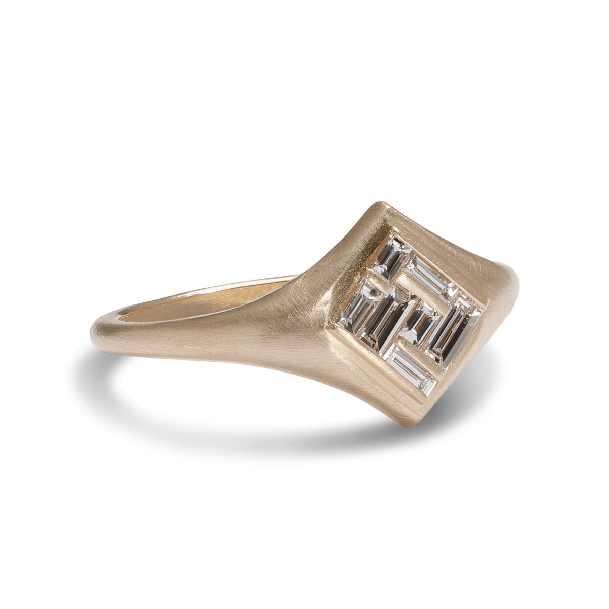 Elicio ring featuring channel-set lab-grown diamonds in a 14K gold band. Designed and handcrafted in Portland, Oregon.