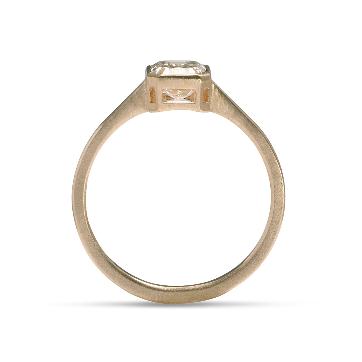 Peekaboo cut out of the Honos ring. It features an emerald cut lab-grown diamond (1.1 carat), and set in 14K recycled gold.
