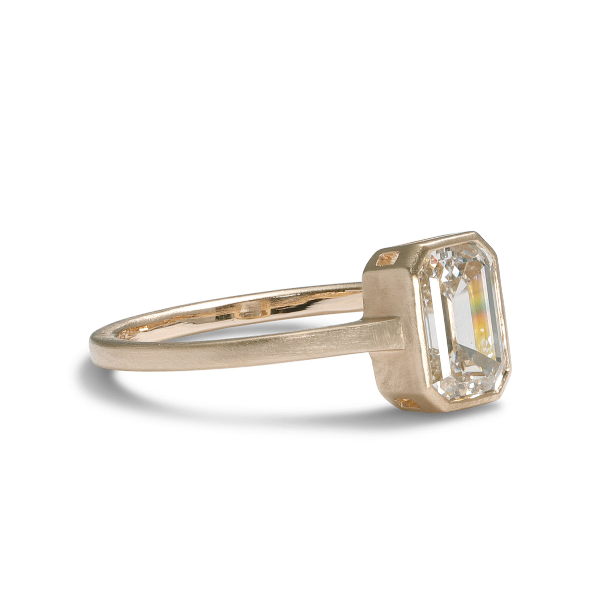 Emerald cut lab-grown diamond Honos ring (1.1 carat). Set in 14K recycled gold and made in Portland, Oregon.