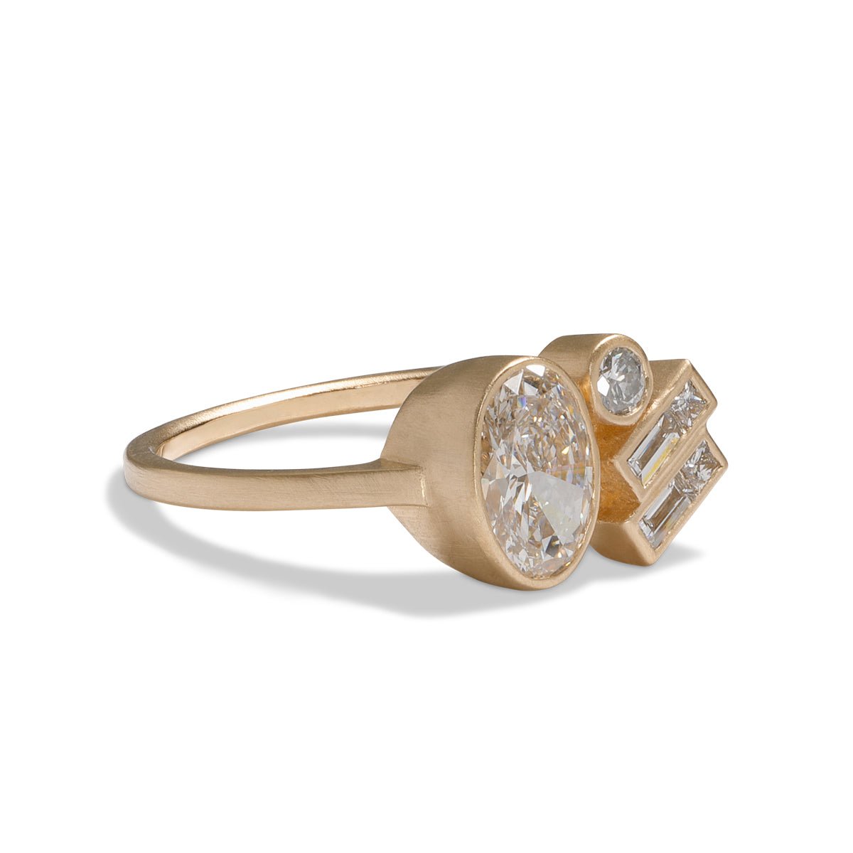 The Laetus ring, designed and handcrafted in our Portland studio. Features a cluster of lab-grown diamonds set in 14K gold.
