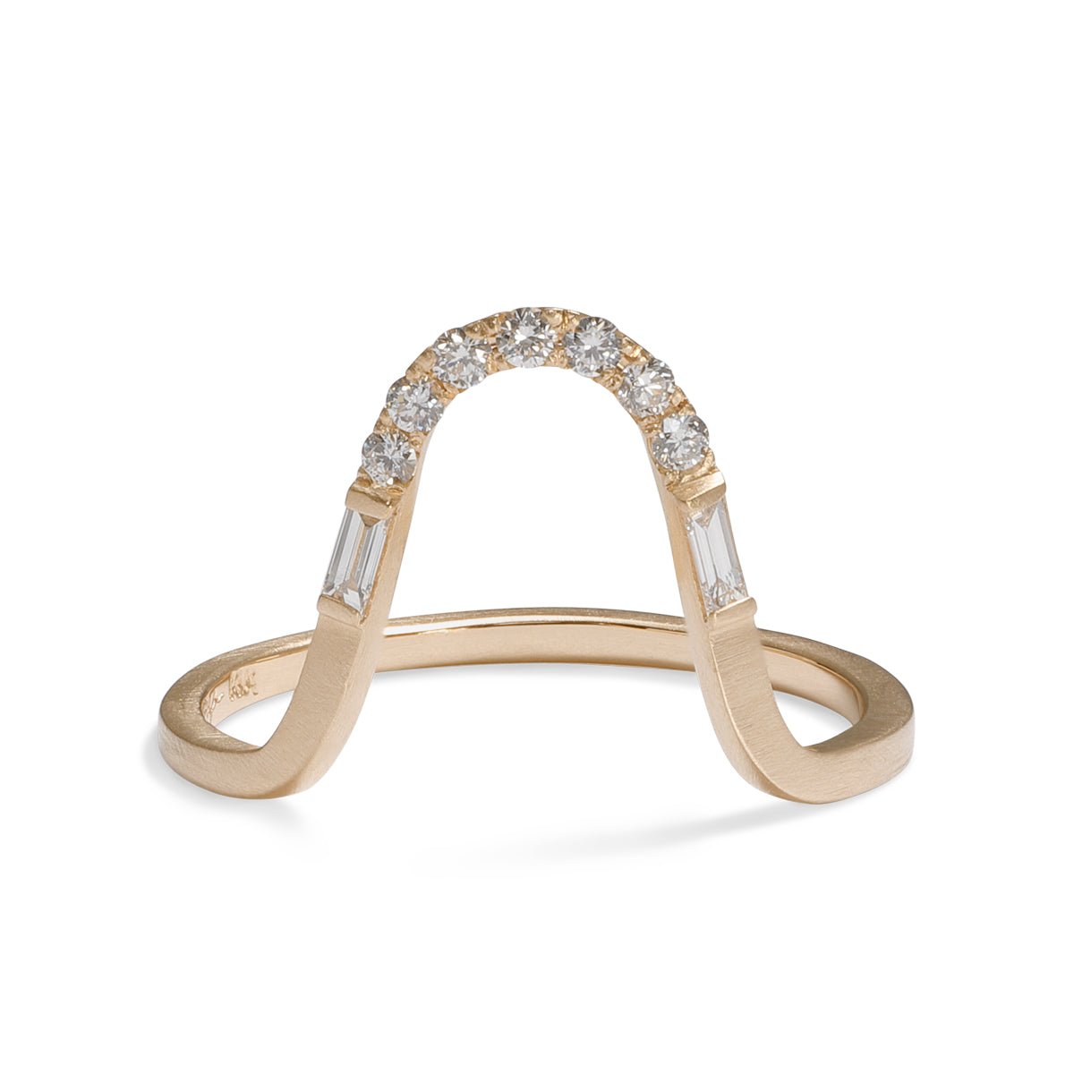 Arched stacking Levo ring. Features lab-grown diamonds in a pavé setting and a 14K recycled gold band.