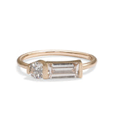 Otium ring with baguette and brilliant-cut round lab-grown diamonds. Set in 14K recycled gold. All stones and materials are conflict-free.