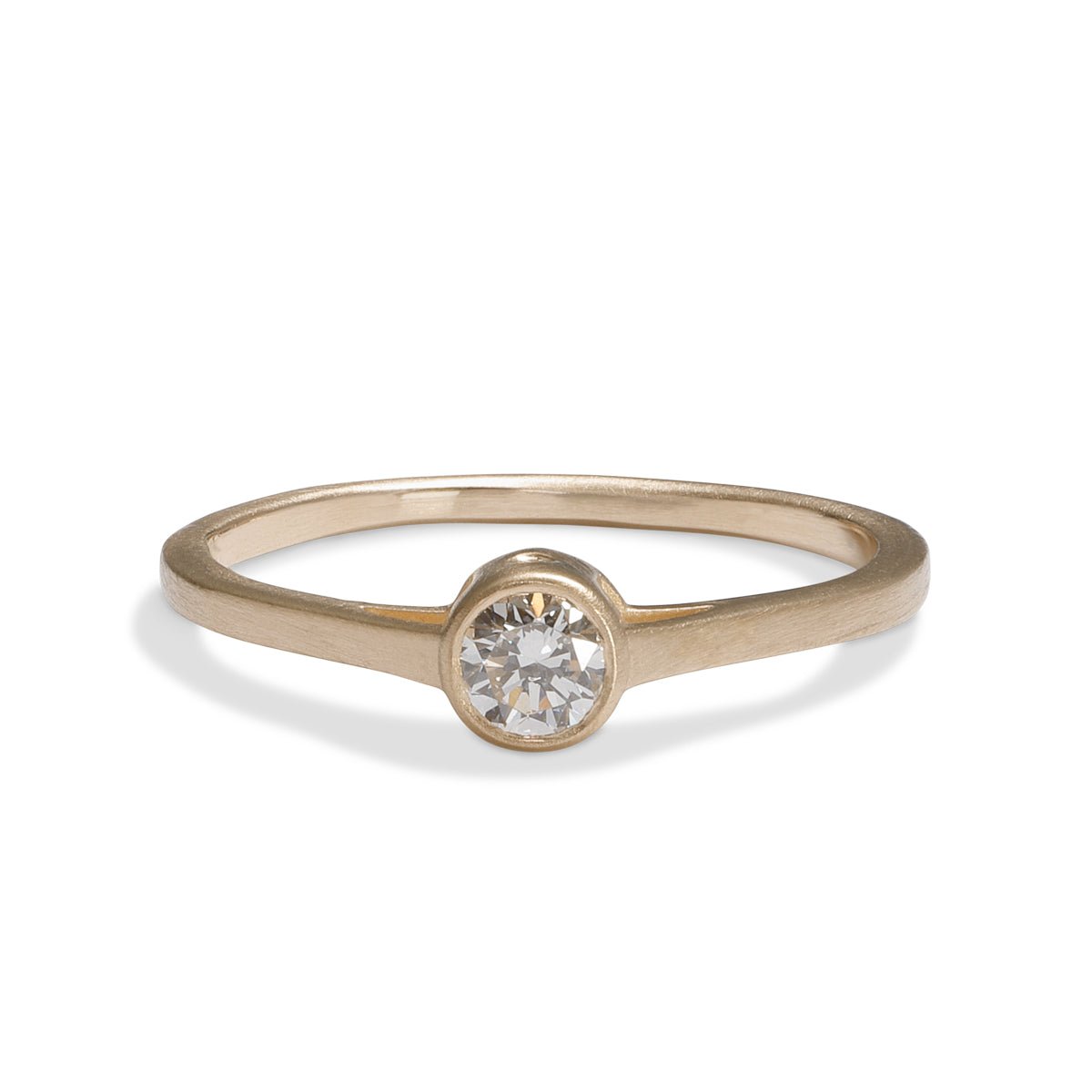 0.25 carat Sano ring, with 3 brilliant cut lab-grown diamonds set in a recycled 14K gold band. Designed and handcrafted in Portland, Oregon.