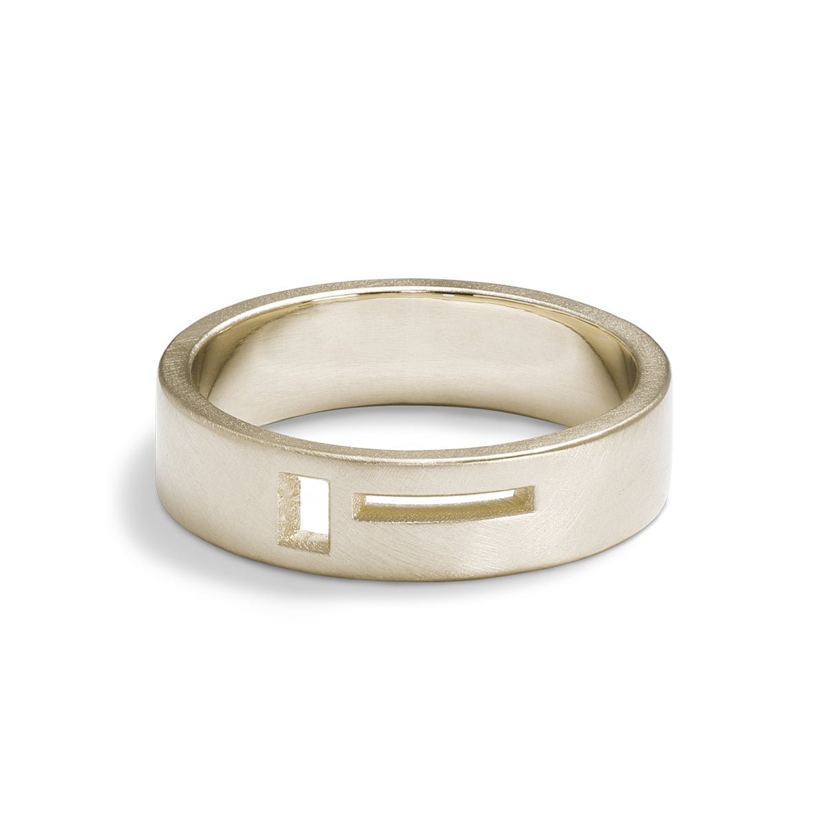 Wide band Sero ring. Features geometric cut-out band in 14K recycled white gold. Designed and crafted in Portland, Oregon.