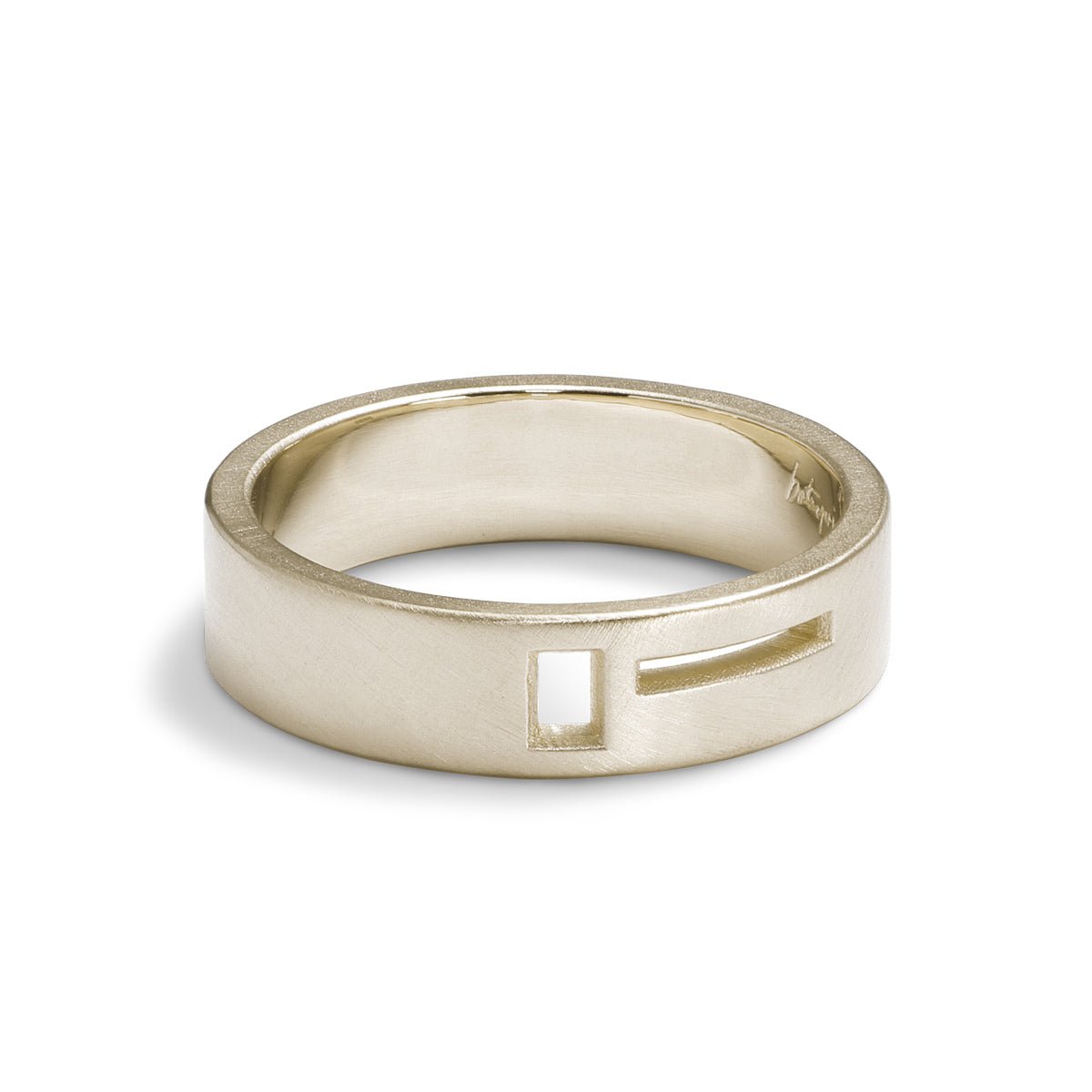 Wide band Sero ring. Features geometric cut-out band in 14K recycled white gold. Designed and crafted in Portland, Oregon.