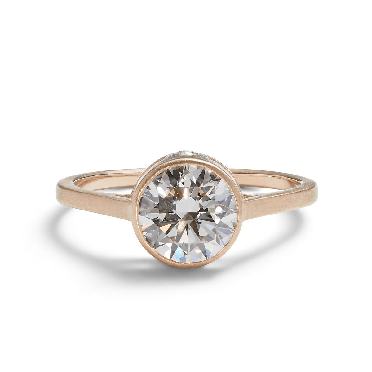 1.4 carat Sano ring, with 3 brilliant cut lab-grown diamonds set in a recycled 14K gold band. Designed and handcrafted in Portland, Oregon.