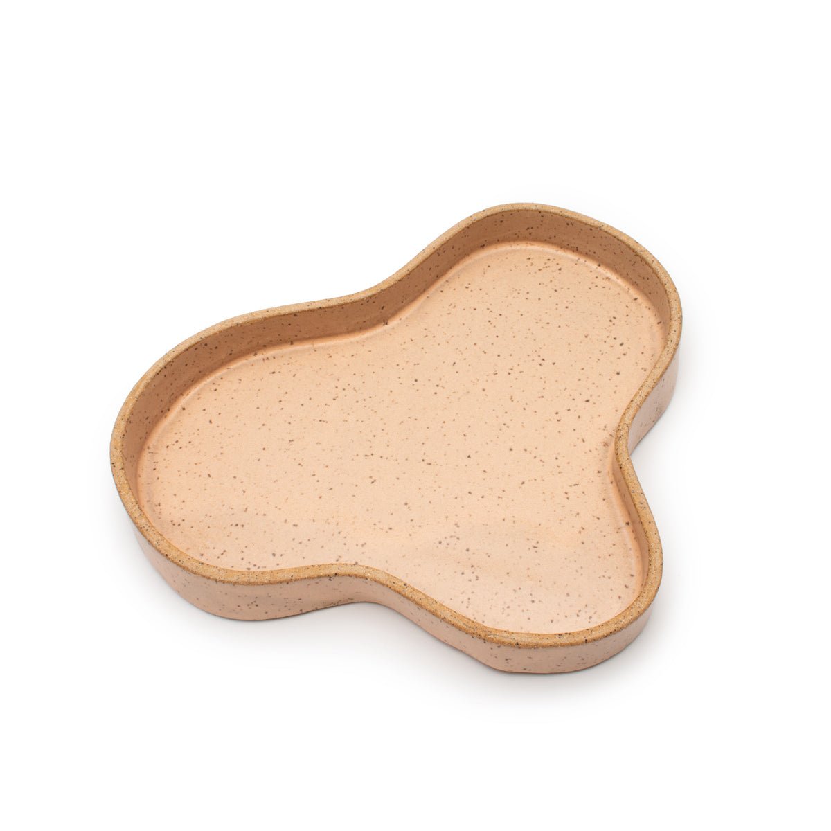 A pink blob tray centered on a white background. The Blob Tray in Pink is designed and handmade by Kohai Ceramics in Portland, OR.