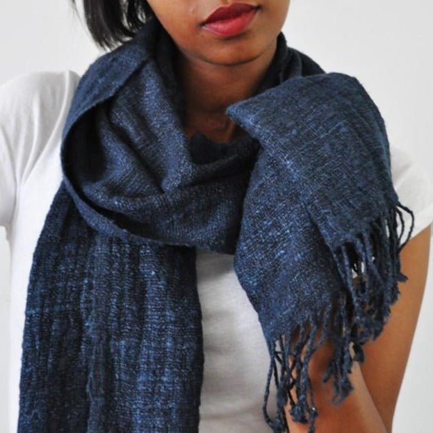 Model wears Eri Silk Scarf in Midnight. 100% Ethiopian Eri silk. Measures 72"x16".