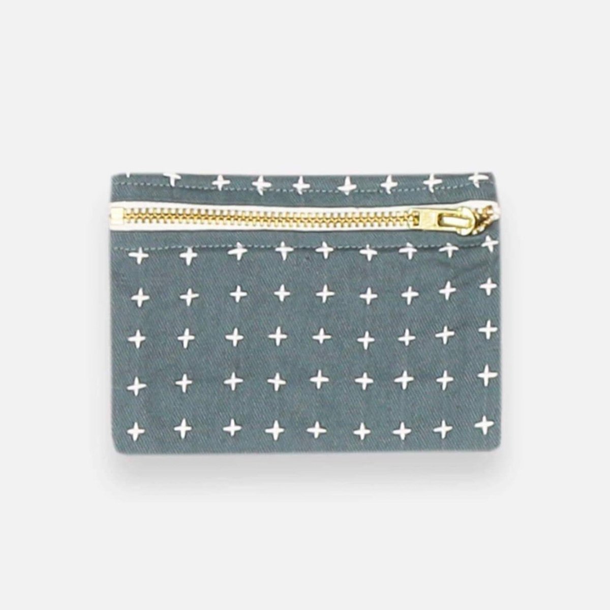 Square cross-stitch coin purse in the color Spruce. Designed by Anchal in Louisville, Kentucky and made in Ajmer, India.