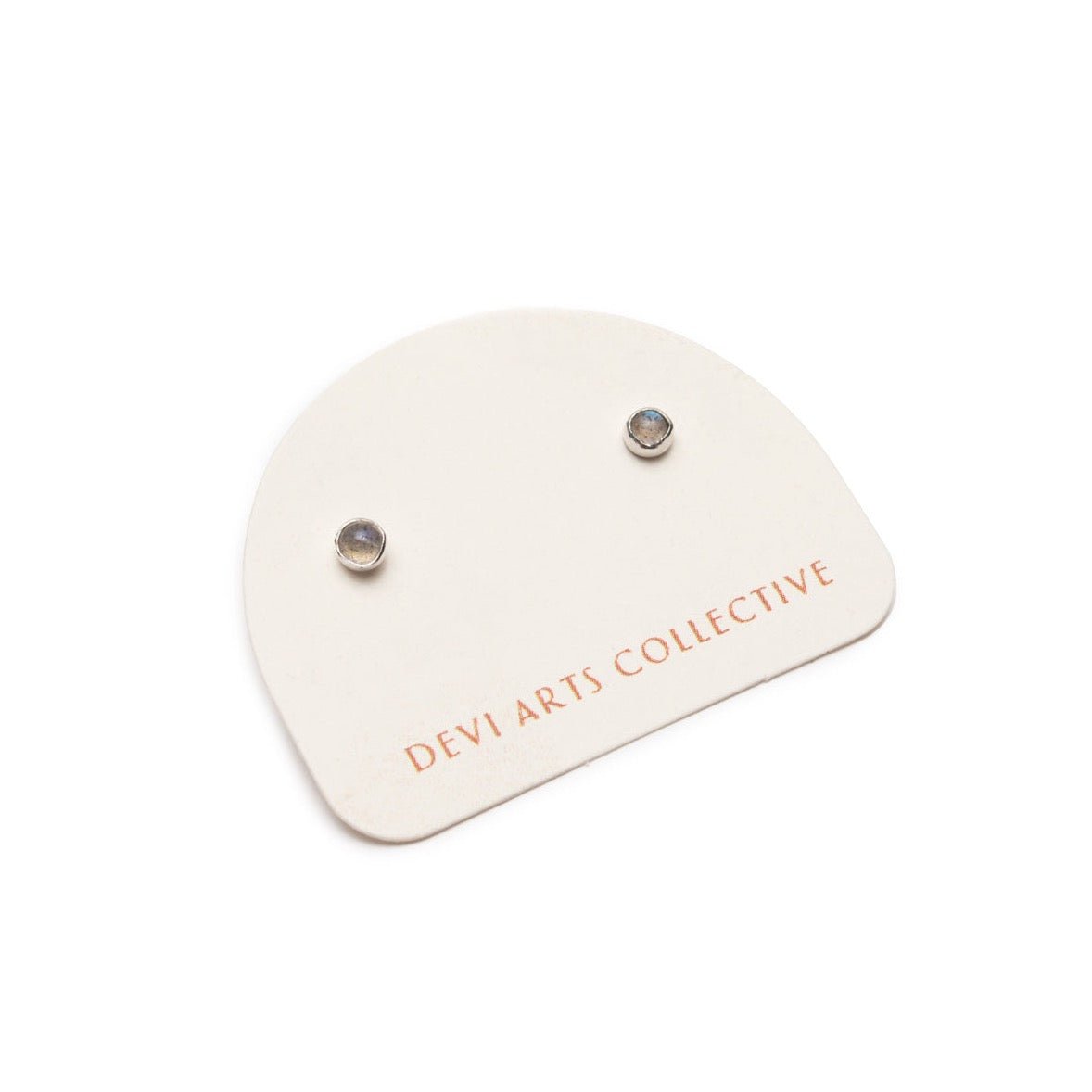 Sterling silver stud earrings with a shimmering labradorite focal stone. The Silver Labradorite Studs are designed and handcrafted by Deivi Arts Collective in Vancouver, Canada.