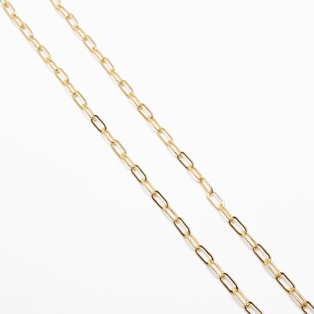 A chain link gold-fill choker style necklace. The Gold-fill Oval Layering Choker is designed and handcrafted by Deivi Arts Collective in Vancouver, Canada.