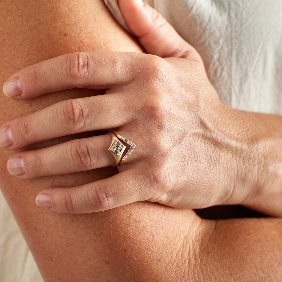 Model wears the Elicio ring stacked on top of the Altus ring.