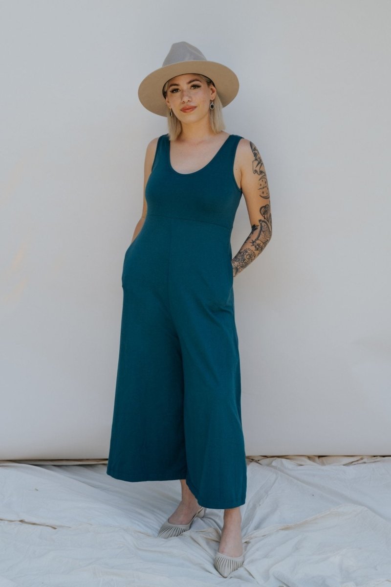 Relaxed sleeveless midi-length jumpsuit with pockets in the color Rich Teal. The Lakeside Jumpsuit is designed by Mien and made in Los Angeles, CA.