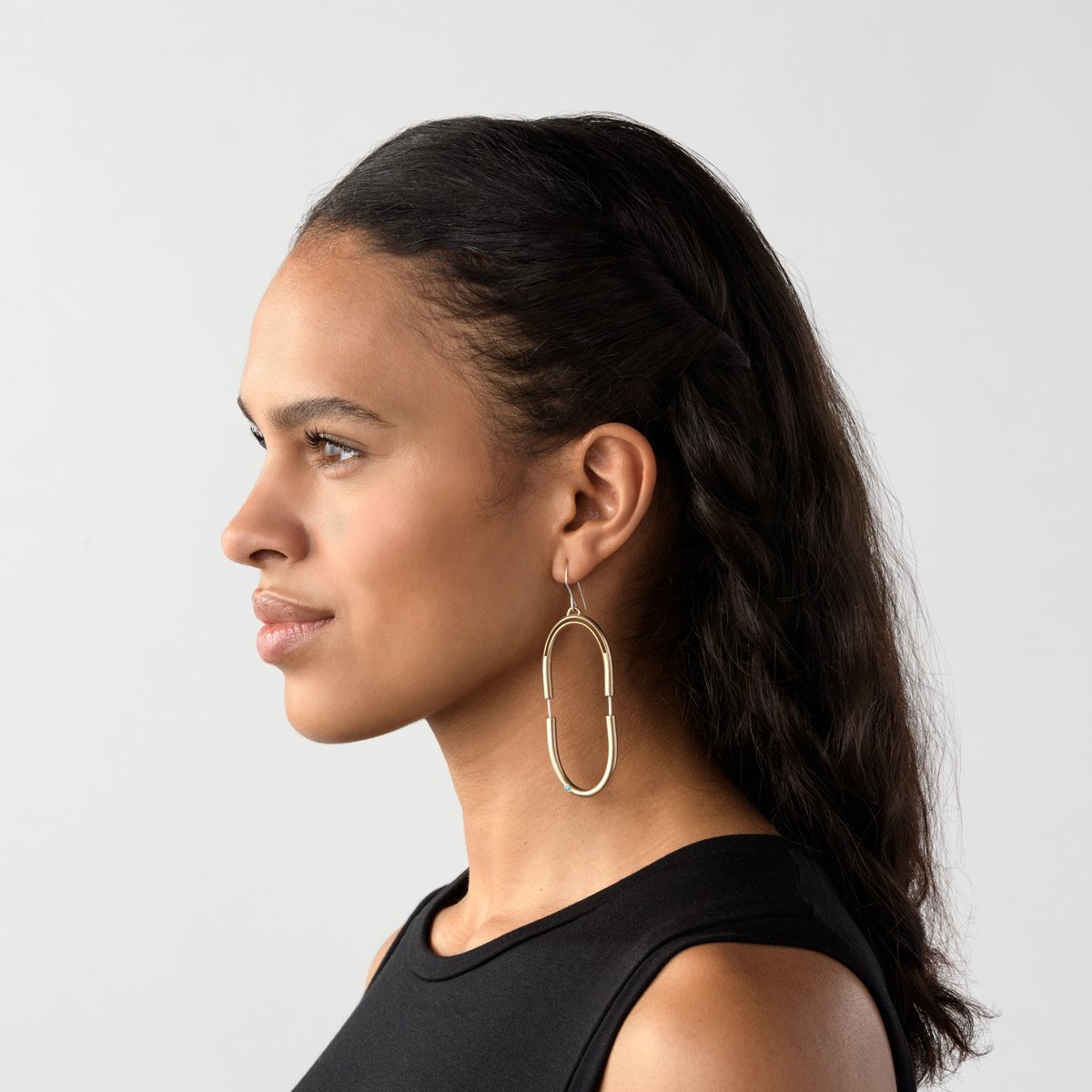 Bronze Mayu earrings on model
