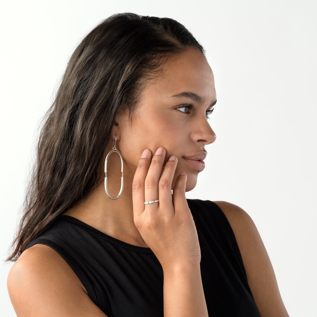 Sterling Silver Runa ring with Kingman turquoise on model