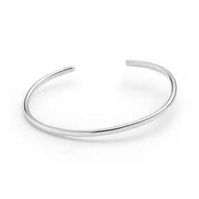 Classic, simple, and adjustable stacking cuff of hand-forged silver-filled wire, with etched notch details on both ends of the cuff. Hand-crafted in Portland, Oregon.