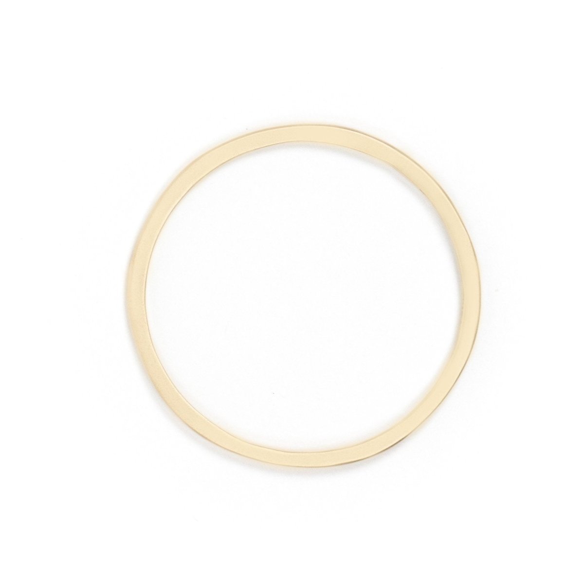 Sturdy, circular, cast-bronze bangle bracelet, featuring one long, slim, cutout slit in the metal. Hand-crafted in Portland, Oregon.