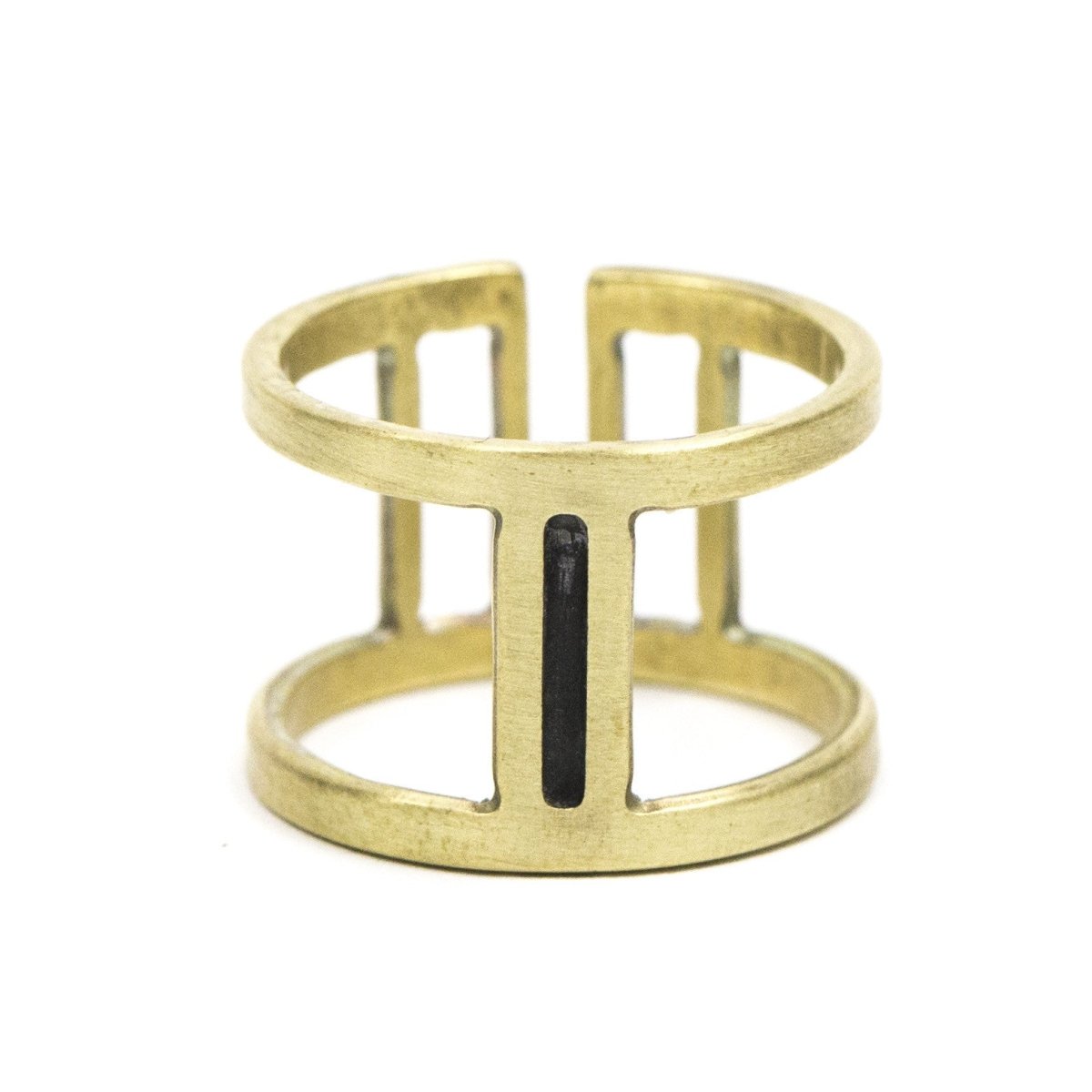 Wide, adjustable brass ring with large, rectangular cutouts surrounding a slim, oxidized center piece. Hand-crafted in Portland, Oregon.