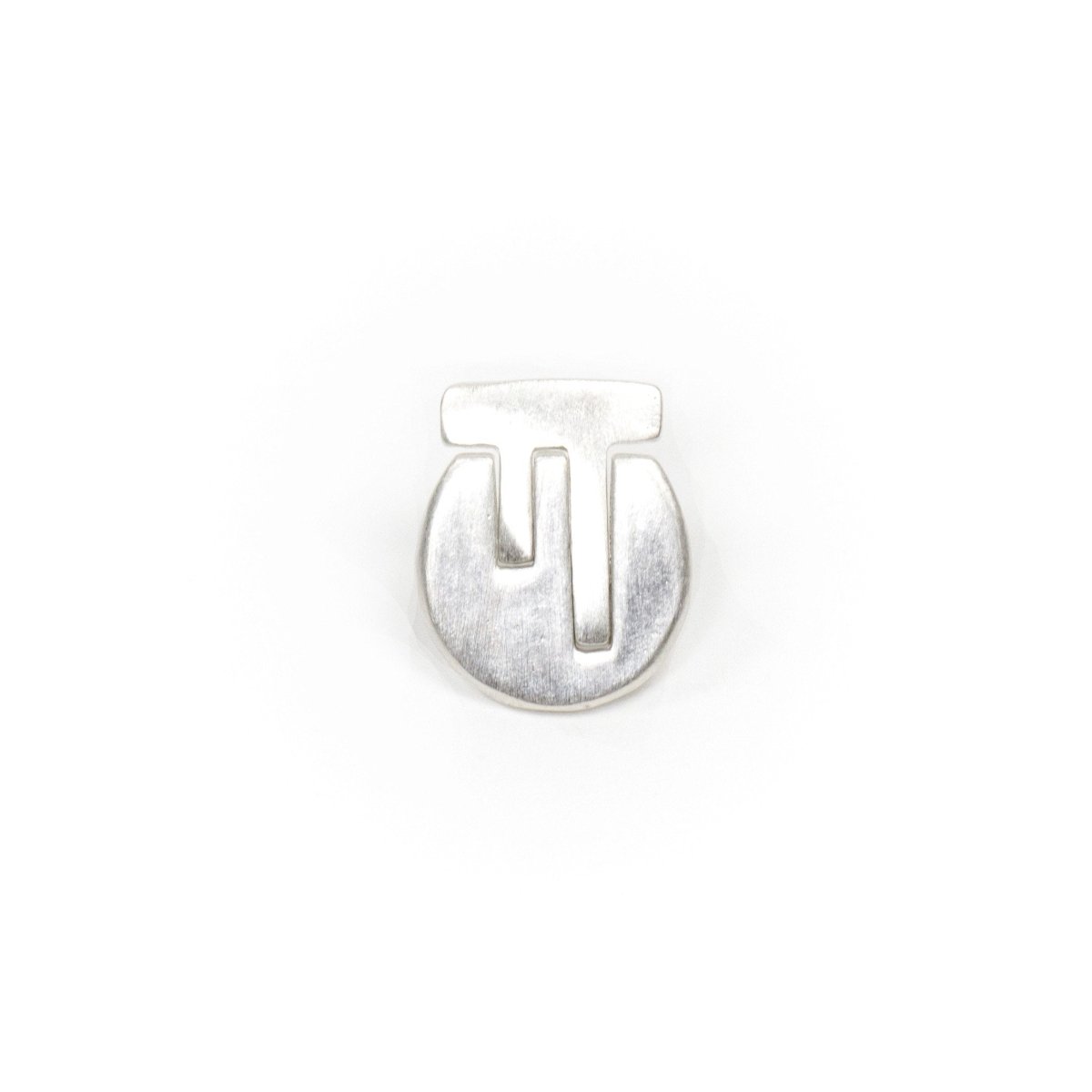 A pair of mismatched, fine silver stud earrings, with complementary geometric cutouts that are fit into one another to create a circular shape with a flat top. Hand-crafted in Portland, Oregon.