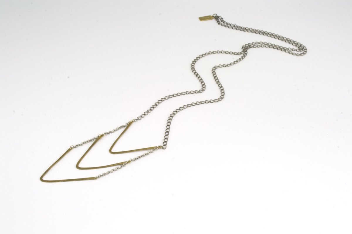 Full length betsy & iya golden sting necklace with hammered chevrons.