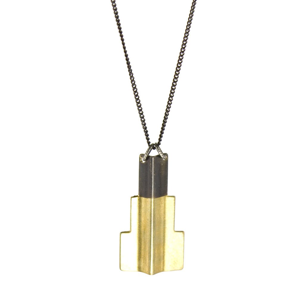 Simple deco inspired gold and black long necklace.