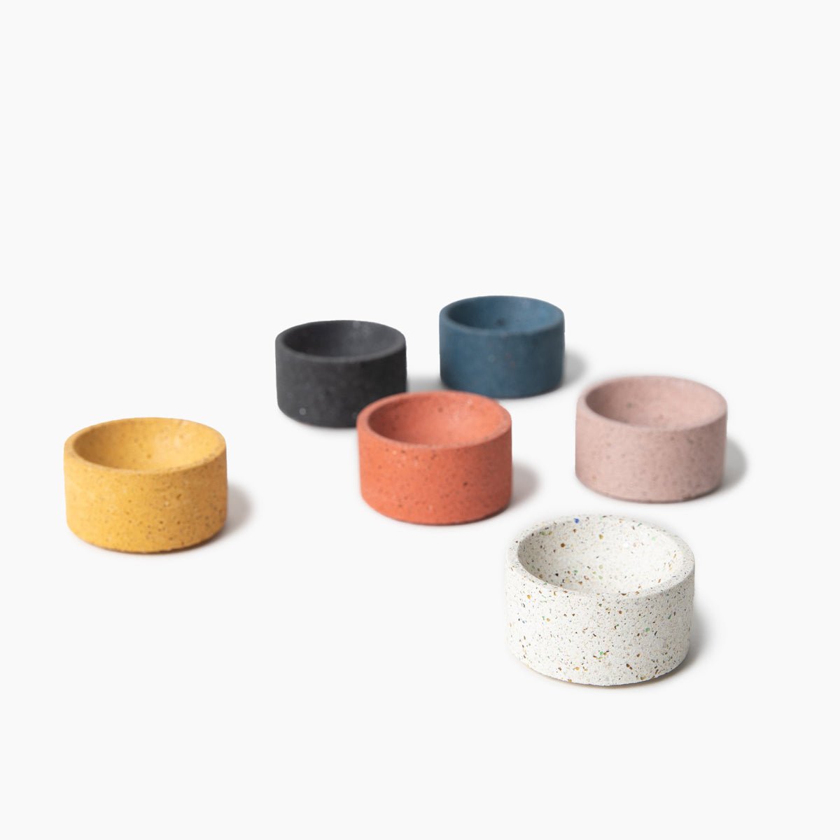 Terrazzo incense holders in assorted colors. Made by Pretti.Cool in Houston, Texas.
