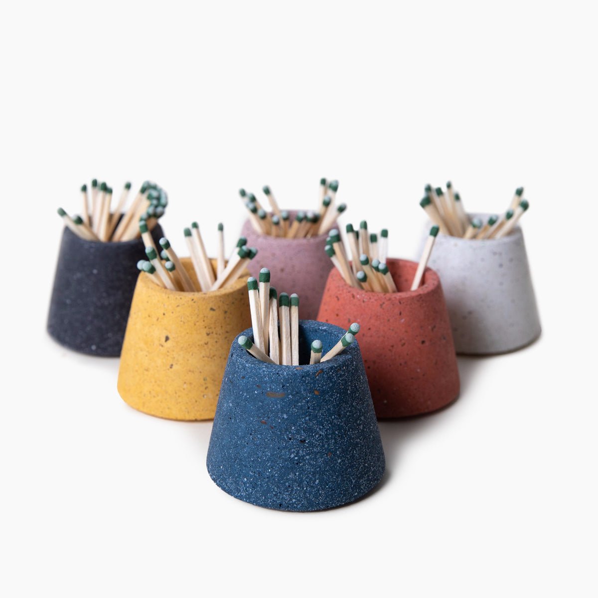 Terrazzo matchstick holders in assorted colors. Made by Pretti.Cool in Houston, Texas.