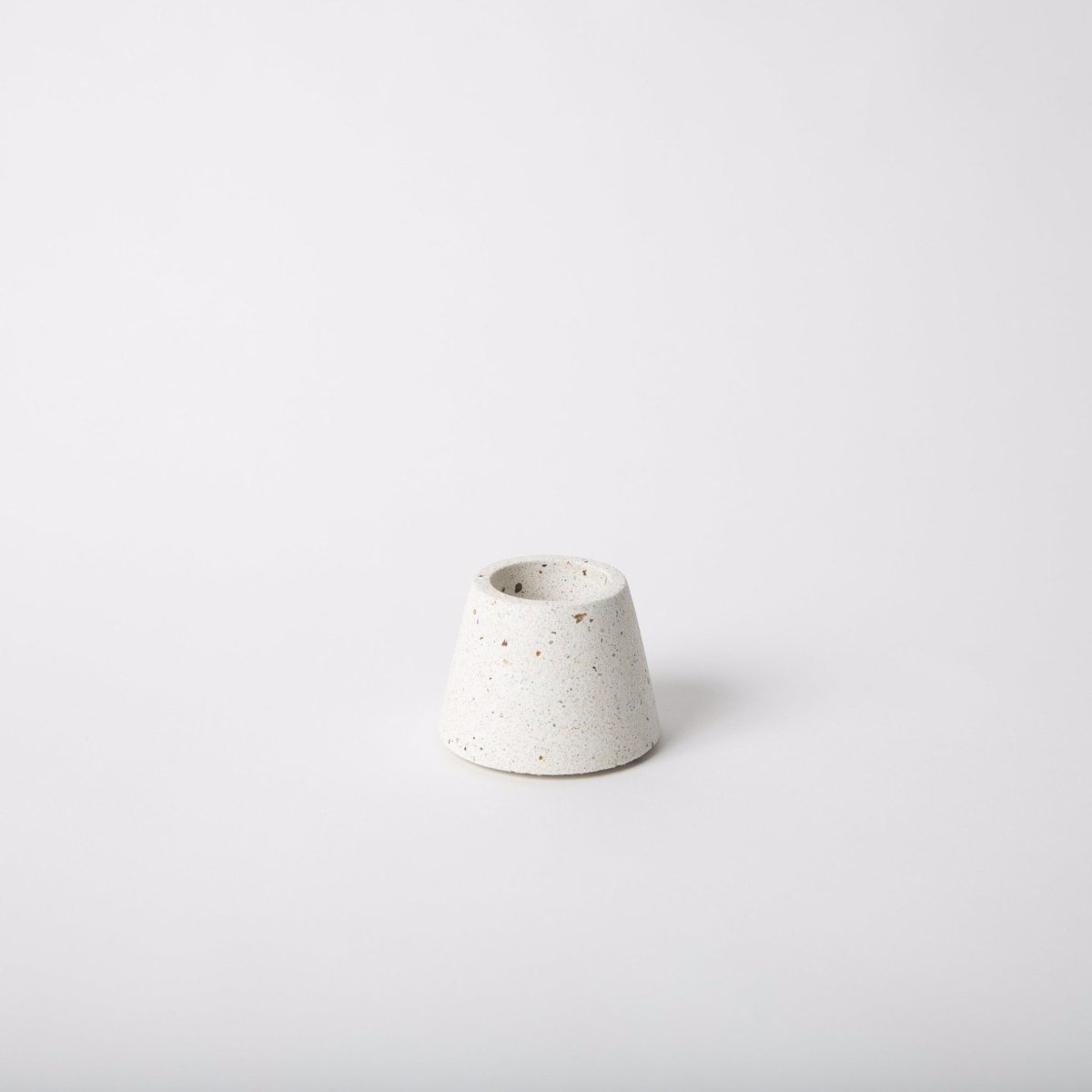 Terrazzo concrete matchstick holder in the shade white. Made by Pretti.Cool in Houston, Texas.