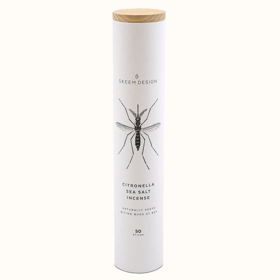 White cylindrical shaped packaging with a black insect design. Contains fifty citronella outdoor incense sticks in the scent sea salt. Made in Philadelphia, PA by SKEEM Design.