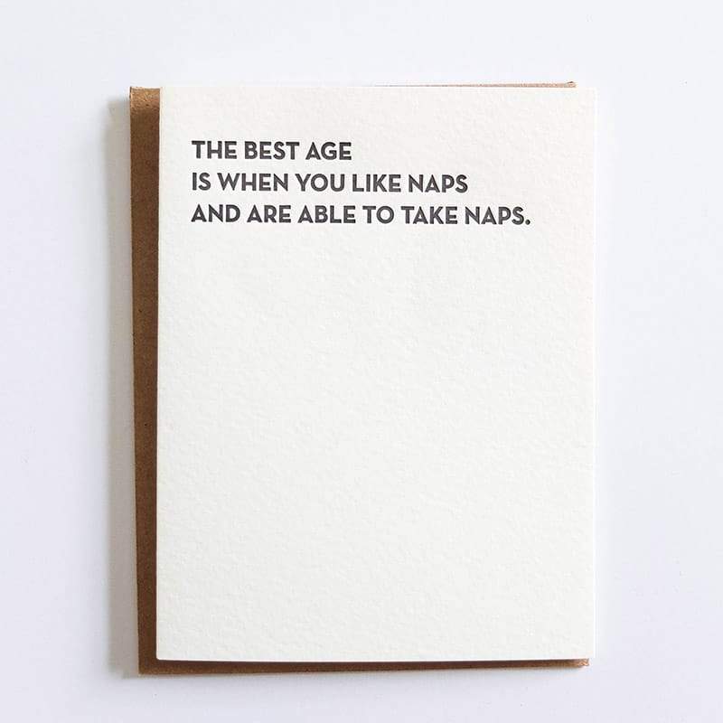 Kraft card with black text that reads: "THE BEST AGE IS WHEN YOU LIKE NAPS AND ARE ABLE TO TAKE NAPS." Designed and made by Sapling Press in Pittsburgh, PA.