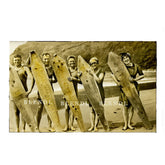 A historical photograph of five surfers and their boards at Oregon's Pacific Coast. Reproduced by Alex Blendl Historic Photos in Portland, Oregon. 