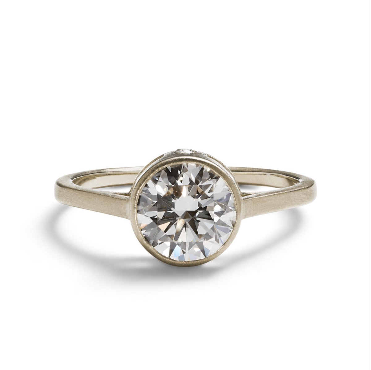 1.4 carat Sano ring, with 3 brilliant cut lab-grown diamonds set in a recycled 14K white gold band. Designed and handcrafted in Portland, Oregon.