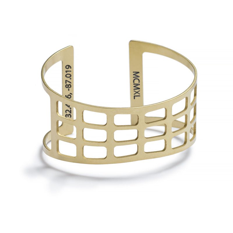 Modern, adjustable cuff of raw brass, modeled after the Edmund Pettus Bridge in Selma, Alabama. Engraved on the inside with the year the bridge was completed and the bridge's geographic coordinates. Hand-crafted in Portland, Oregon.