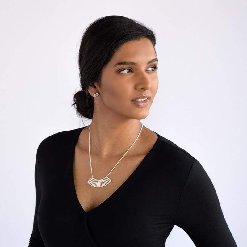 Sona fan pendant necklace in sterling silver on model