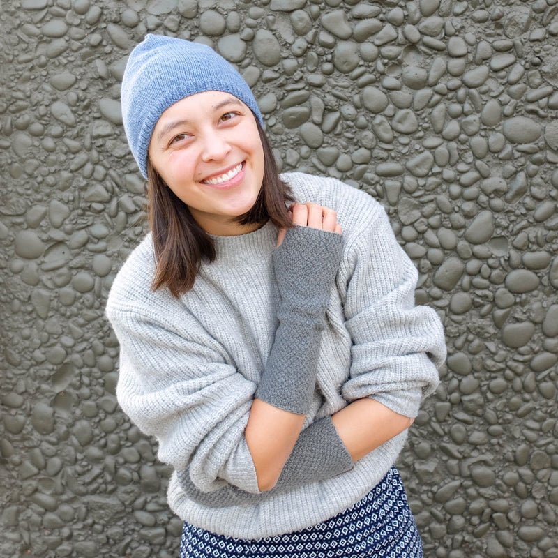Hand-knit Stina Half Mitts in Pebble Grey from Dinadi