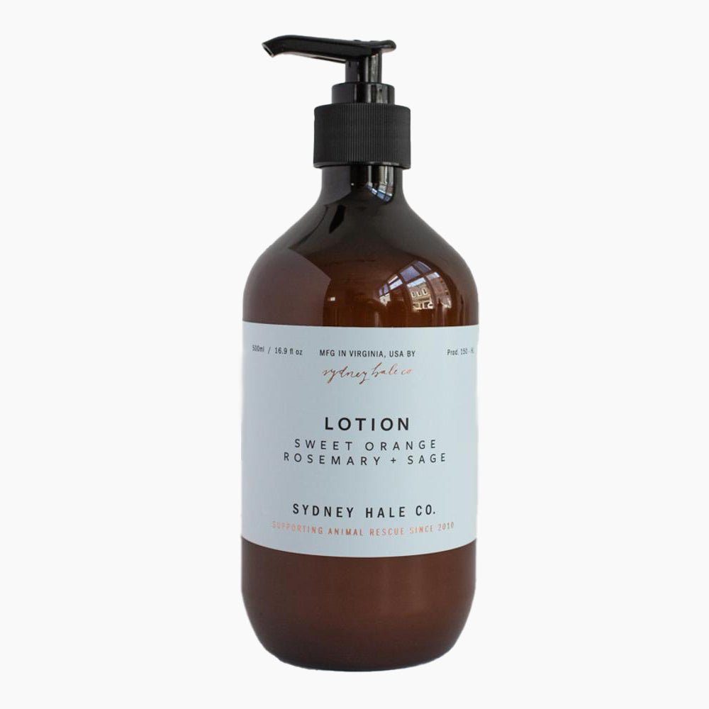 Amber lotion bottle against a white background. The label reads "LOTION Sweet Orange Rosemary + Sage Sydney Hale Co"