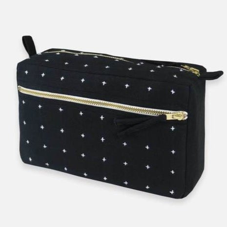Square toiletry bag with white cross-stitch detailing. Designed by Anchal and handmade in Ajmer, India.
