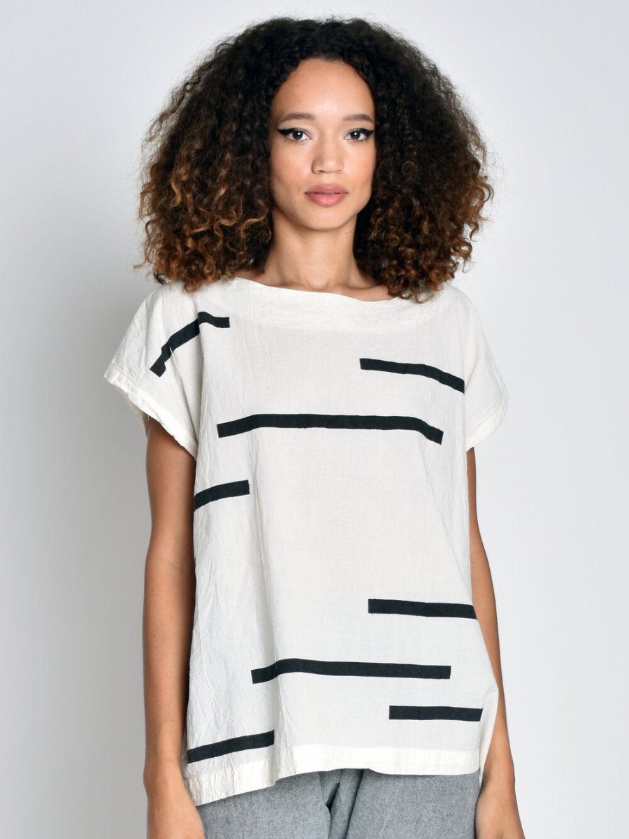 White short sleeved tunic with black horizontal stripes. Designed and sewn by UZI in Brooklyn, New York.