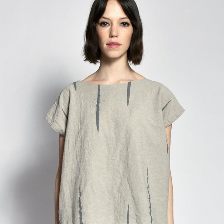 Warm grey short sleeved tunic with dark grey vertical stripes. The Tunic in Oatmeal Scratch is designed and sewn by Uzi in Brooklyn, NY.