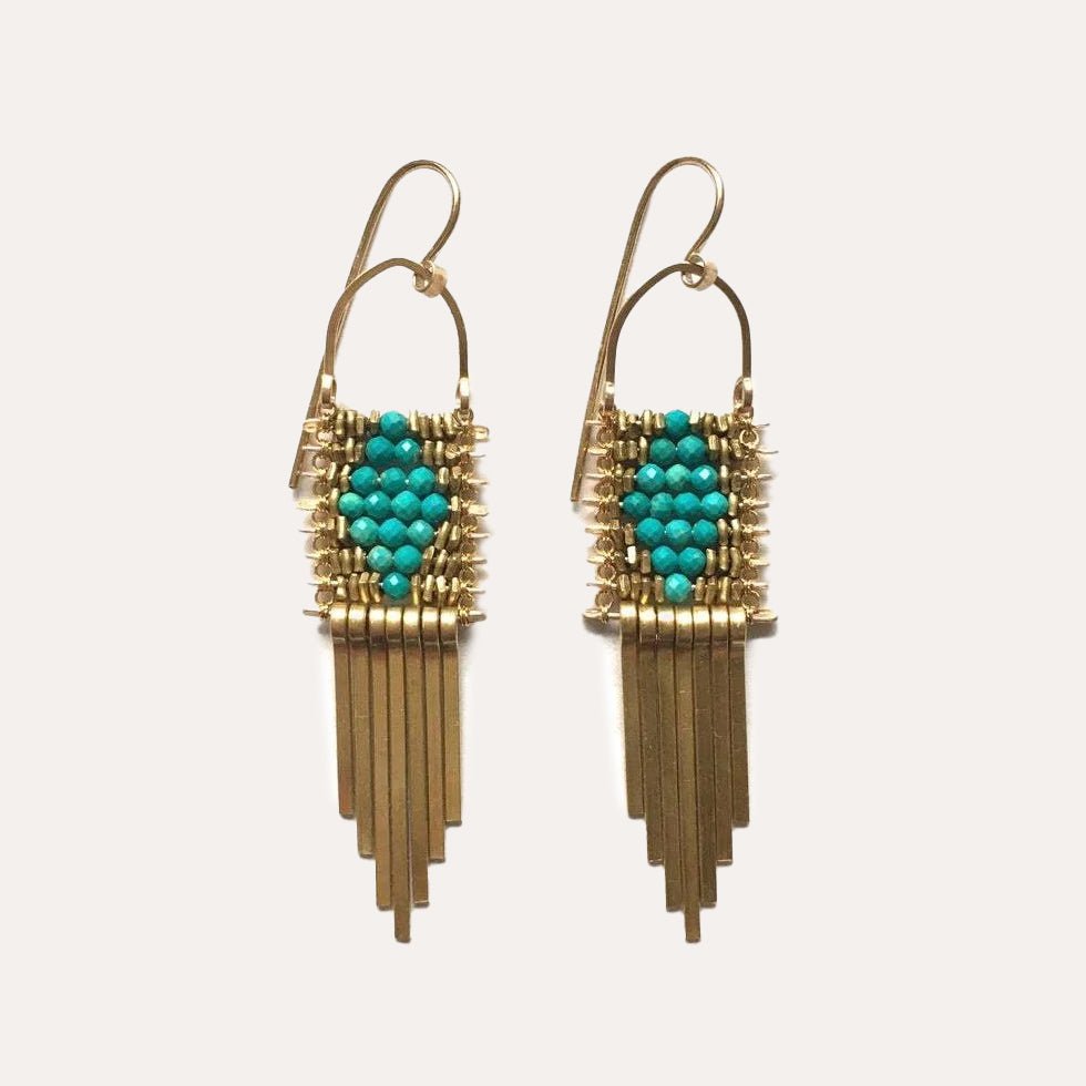 Round turquoise beads in a diamond shape with brass beads and brass tassels. Designed and handcrafted by Demimonde in Portland, Oregon.