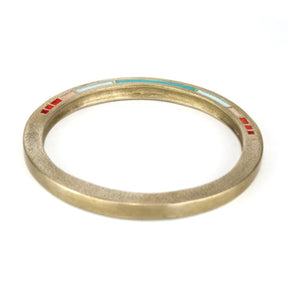 Cast bronze bangle with Mexico colors.