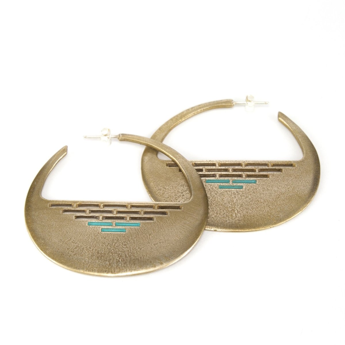 Handmade round cast earrings.