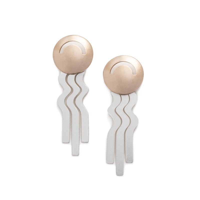 Lightweight, bronze, domed studs with wavy sterling silver fringe. Hand-crafted in Portland, Oregon.
