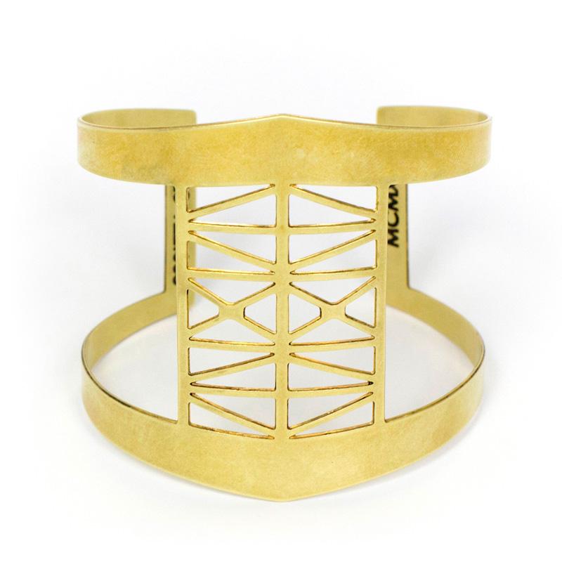 Modern, bold, and adjustable brass cuff bracelet modeled after the Steel Bridge in Portland, Oregon, with the bridge's coordinates and date of construction engraved on the inner cuff. Hand-crafted in Portland, Oregon.